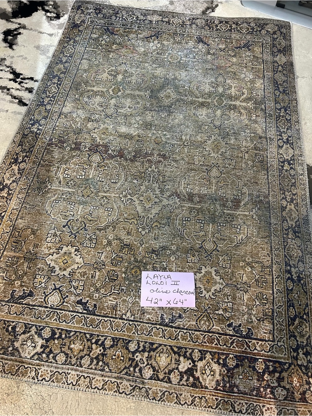 42 × 64 inches = 3.5 × 5.33 feet.
 Layla Area Rug - new condition